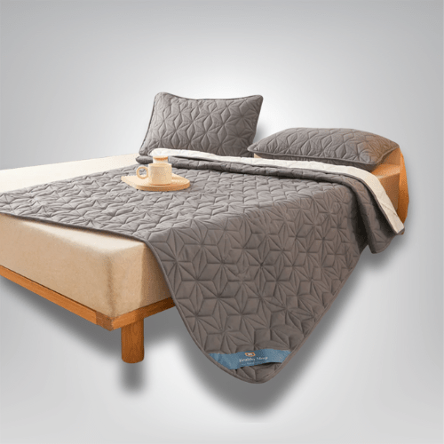 Protège matelas imperméable avec élastique, quilté 140/160 cm - Maison Dormia